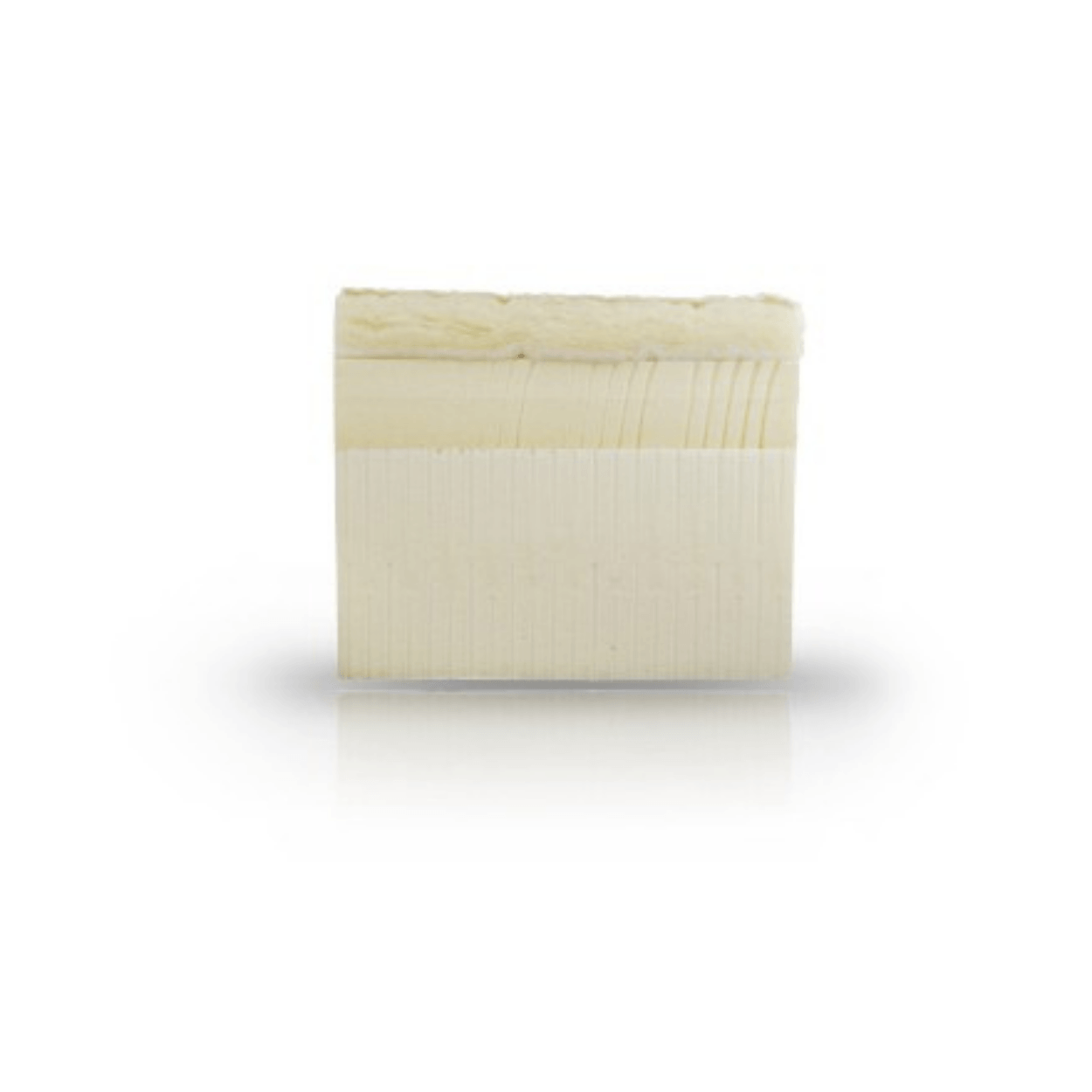 Rectangular bar of mattress foam with a ribbed texture on a white background