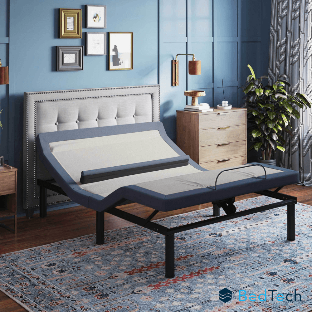 Adjustable BedTech bed in a bedroom setting with blue walls and decorative elements.