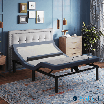 Adjustable BedTech bed in a bedroom setting with blue walls and decorative elements.