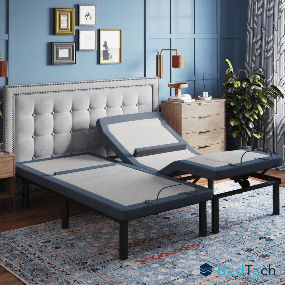 Adjustable BedTech bed in a bedroom setting with blue walls and decorative elements.