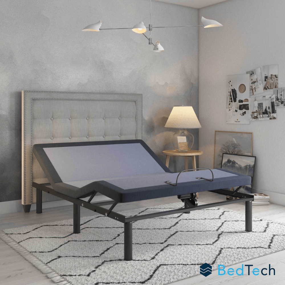 BedTech adjustable bed in a bedroom setting with a gray headboard and decor.
